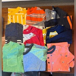 Lot of 9 boys 2T shirts. Long and short sleeve.